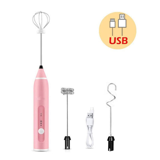 Pink USB rechargeable electric milk frother with three whisk heads for coffee and cooking. Shop NOW
