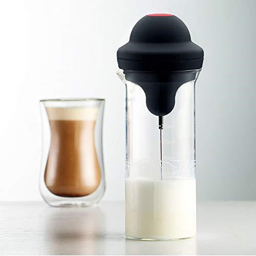 Handheld stainless steel milk frother whisk creating dense foam. Ideal for lattes and cappuccinos at home. Shop