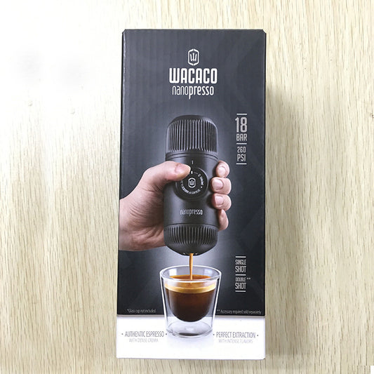 Wacaco Nanopresso packaging on a wooden surface