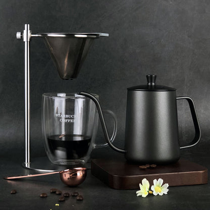 Full pour-over coffee brewing setup with black gooseneck kettle, glass mug, and coffee filter. Perfect for home coffee lovers. #CoffeeLover #BrewAtHome