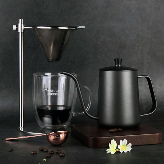 Full pour-over coffee brewing setup with black gooseneck kettle, glass mug, and coffee filter. Perfect for home coffee lovers. #CoffeeLover #BrewAtHome