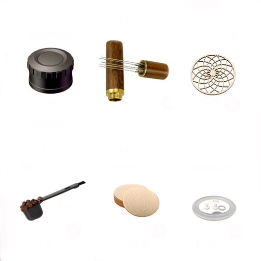 Assortment of coffee accessories: tamper, WDT tool, wooden coaster, coffee scoop, filter papers, moka pot spare parts.