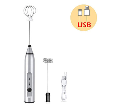  Silver electric handheld milk frother with whisk and USB charging cable. Shop now!