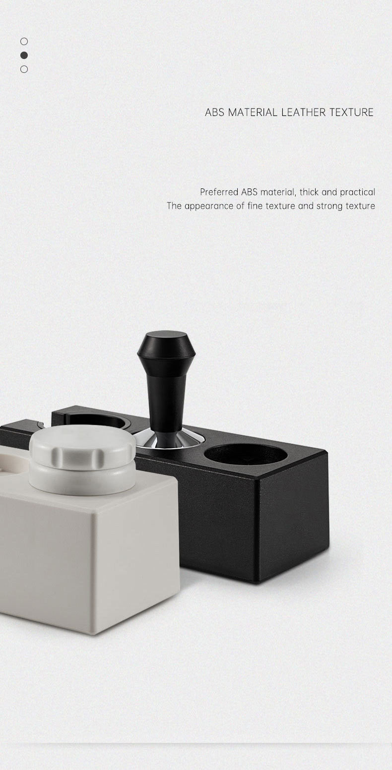 Black and white cylindrical object with a textured finish on a white background