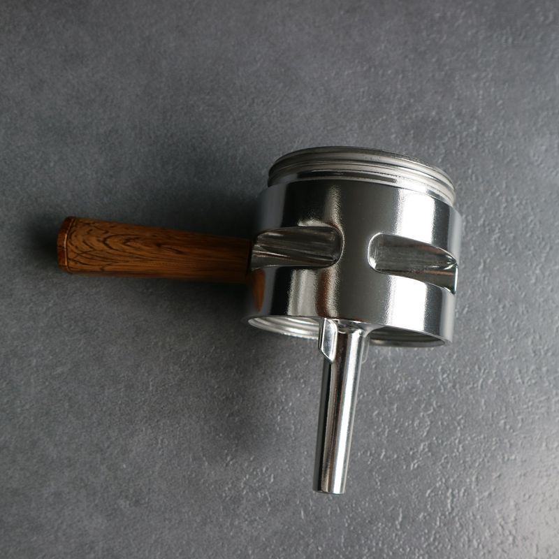  Silver Moka Pot handle and spout. Stovetop espresso maker with wooden handle. Home coffee brewing tool.