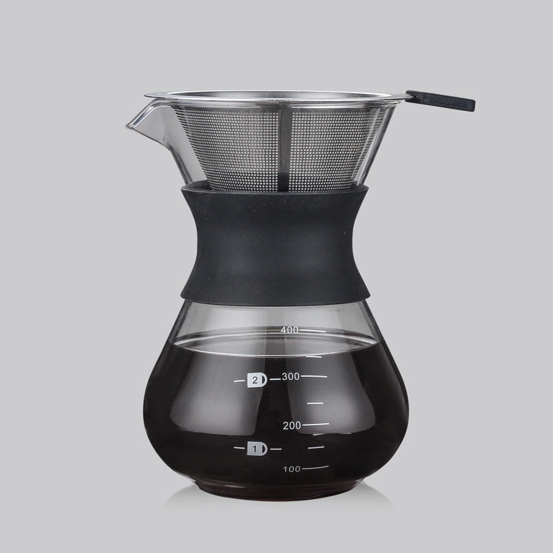 Coffee brewing device with glass carafe and metal filter on a gray  shop now  free shipping 