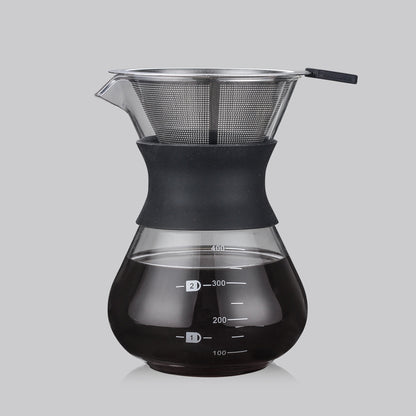 Coffee brewing device with glass carafe and metal filter on a gray  shop now  free shipping 