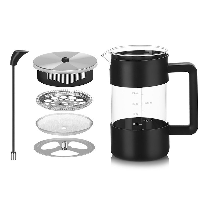 An exploded view of a black and clear borosilicate glass French press coffee maker, showing its individual components: the stirring stick/frother, the lid, the plunger with its multi-layer filter system (mesh filter, coil, and retaining plate), and the main glass carafe with black base and handle, marked with volume measurements (12 oz, 16 oz, 20 oz, 24 oz, and 400 ml, 600 ml).