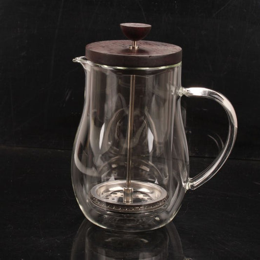 Elegant glass French press coffee maker with rosewood lid and stainless steel plunger, ideal for home brewing. #FrenchPress #CoffeeLover