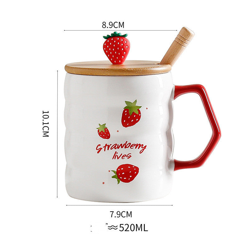 White mug with red handle and strawberry design, featuring a wooden lid and spoon, with measurements indicated.