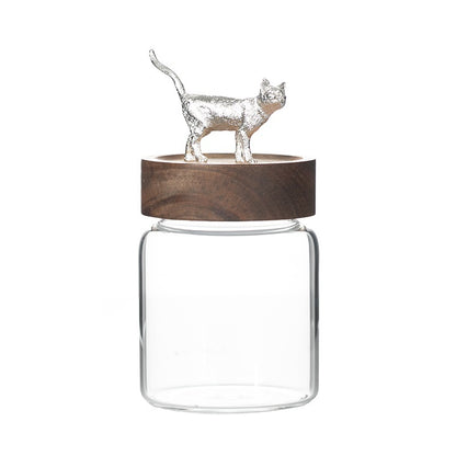 Glass jar with wooden lid and silver cat