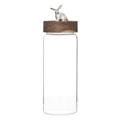Glass jar with wooden lid featuring a rabbit ornament long