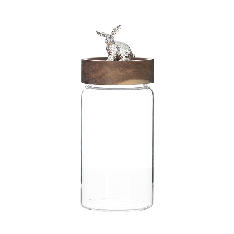 Glass jar with wooden lid featuring a rabbit ornament