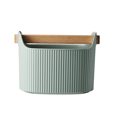 Green ribbed storage basket with wooden handle on a white background Shop Now