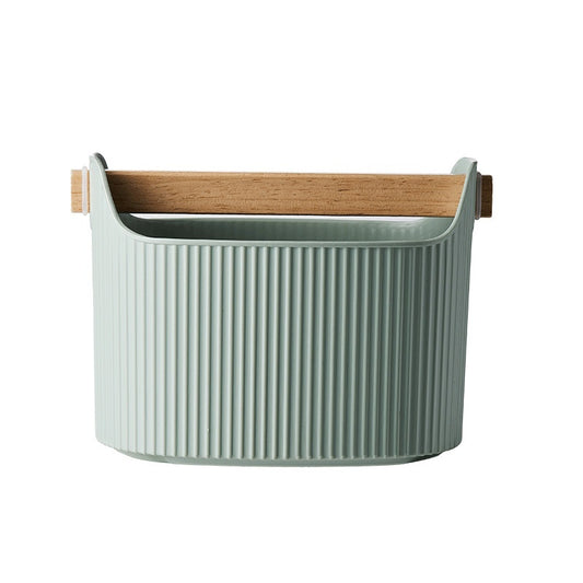 Green ribbed storage basket with wooden handle on a white background Shop Now