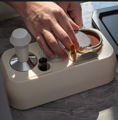 Hand interacting with a grooming tool on a marble surface