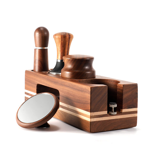 Side profile of a wooden coffee tamping station with an anti-slip mat and organized espresso tools. Shop Now