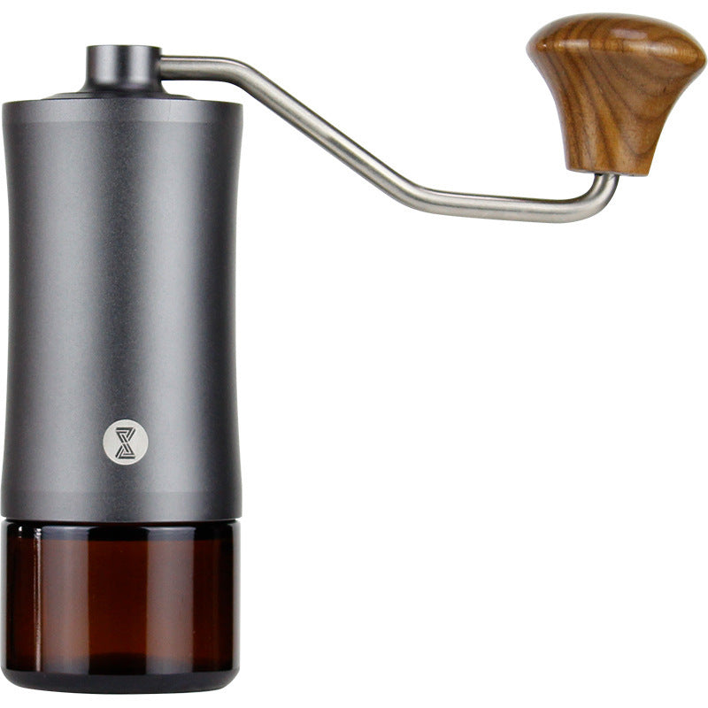 Hand coffee grinder with wooden handle on a white background