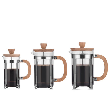 Three French press coffee makers with wooden handles on a white background Shop now free shipping