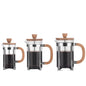 Three French press coffee makers with wooden handles on a white background Shop now free shipping
