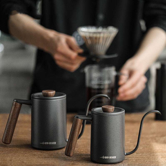 MHW-3BOMBER Planet gooseneck coffee kettle 600ml in matte black with dark wood handle. Ideal for pour over coffee.