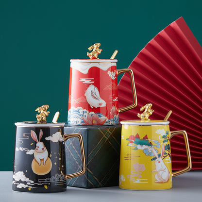 Set of four decorative mugs with animal designs on a green background