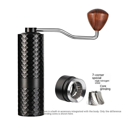 Manual coffee grinder with wooden handle and metallic body on a white background