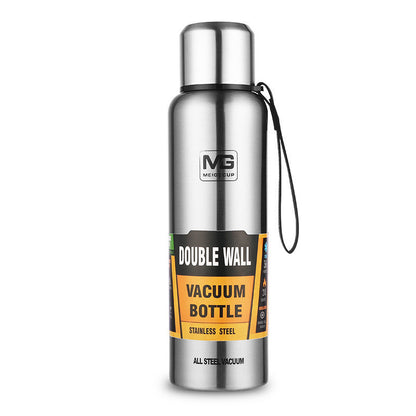 Silver double wall vacuum bottle with a label on a white background Shop now
