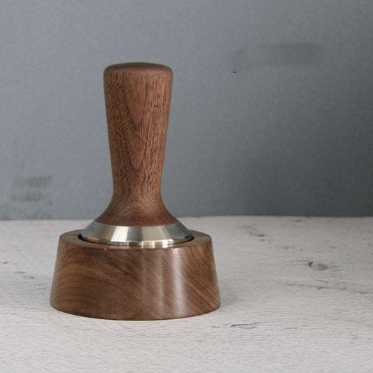 Wooden coffee tamp with metal base on a gray background Shop now Free shipping